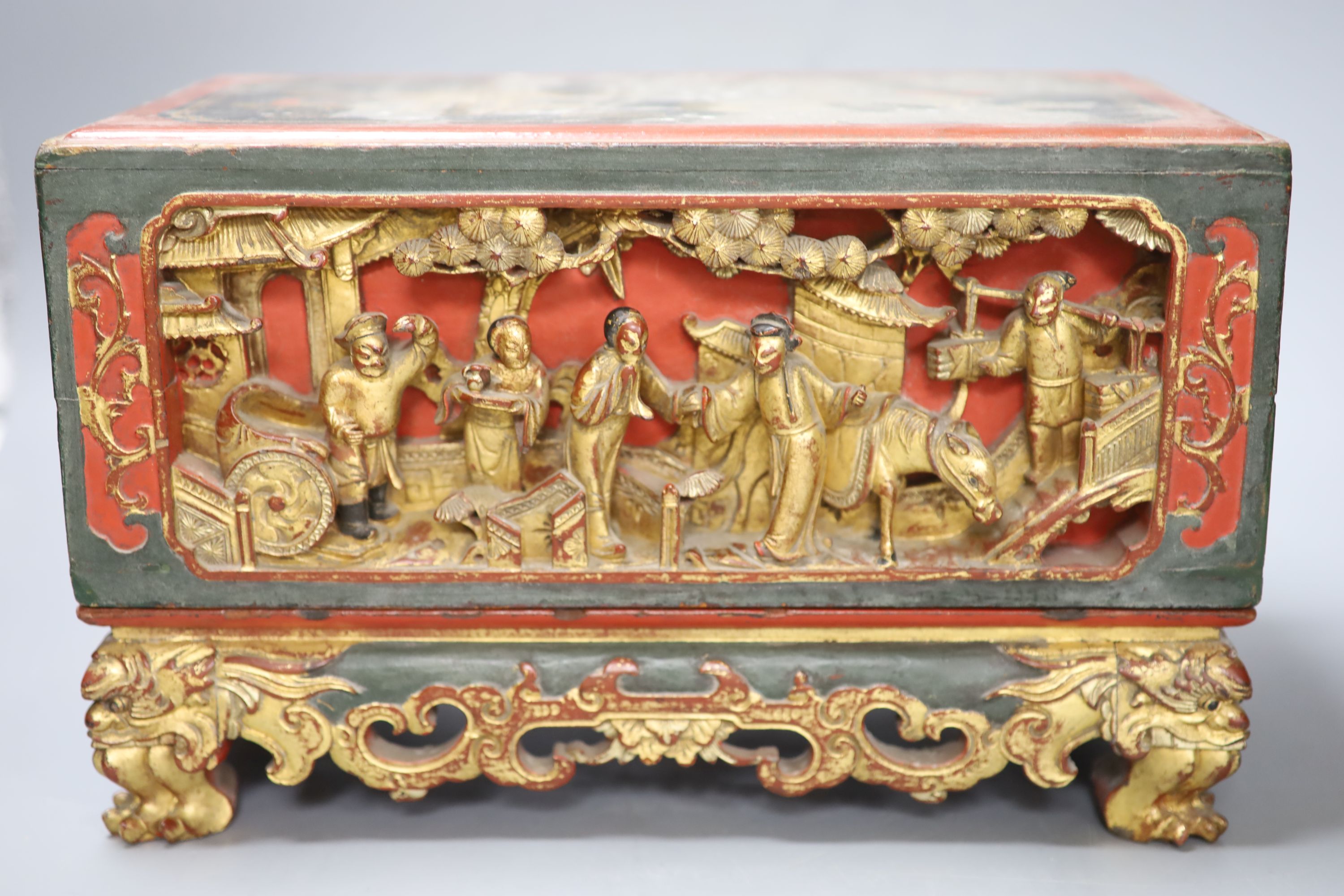 A 19th century Chinese red lacquer and gilt offering box (chanab), length 33cm